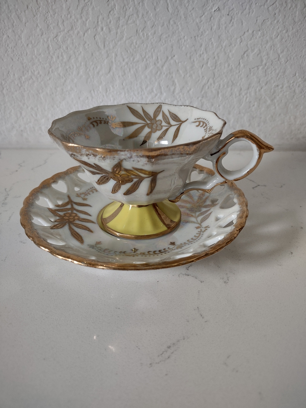 Lipper International White and Gold Footed Teacup and Saucer